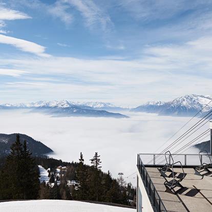 Panoramic view during winter at the mountain station of the Meran 2000 funicular